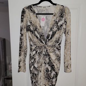 New with tags. Snake skin print front knot mini dress